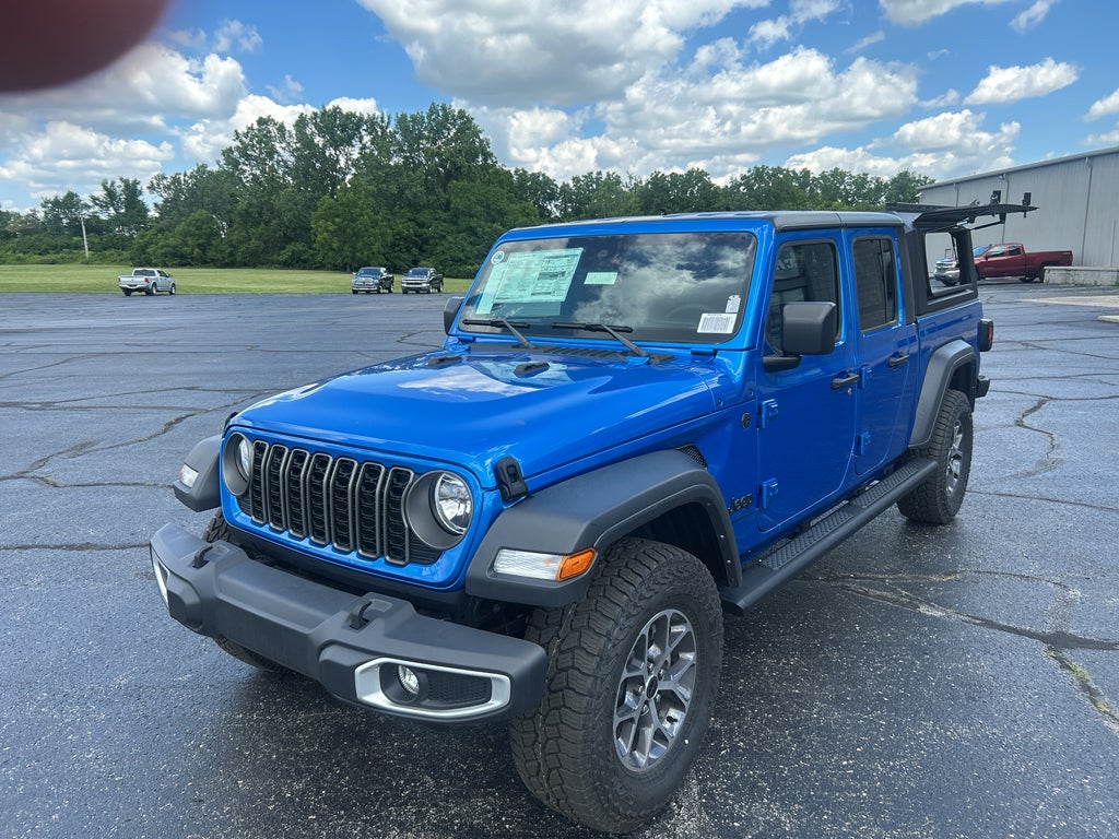 2025 Jeep Gladiator Sport S in Hydro Blue Pearlcoat — front three-quarter view