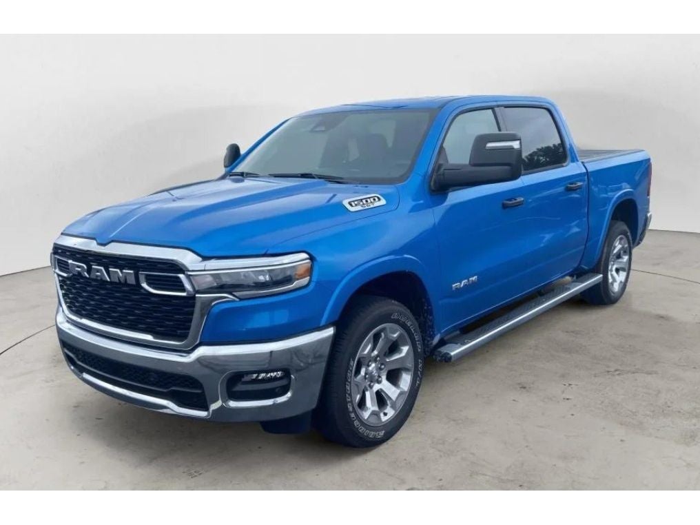 2025 RAM 1500 Big Horn Crew Cab 4x4 5'7' Box in Hydro Blue Pearlcoat — front three-quarter view