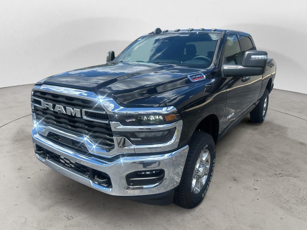 2026 RAM Ram 2500 RAM 2500 BIG HORN CREW CAB 4X4 6'4' BOX in Diamond Black Crystal Pearl-Coat Exterior Paint — front three-quarter view