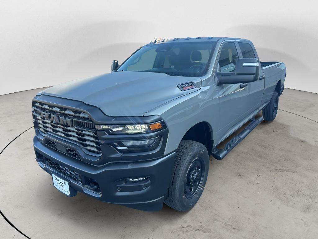 2026 RAM Ram 2500 RAM 2500 TRADESMAN CREW CAB 4X4 8' BOX in Ceramic Gray Clear-Coat Exterior Paint — front three-quarter view